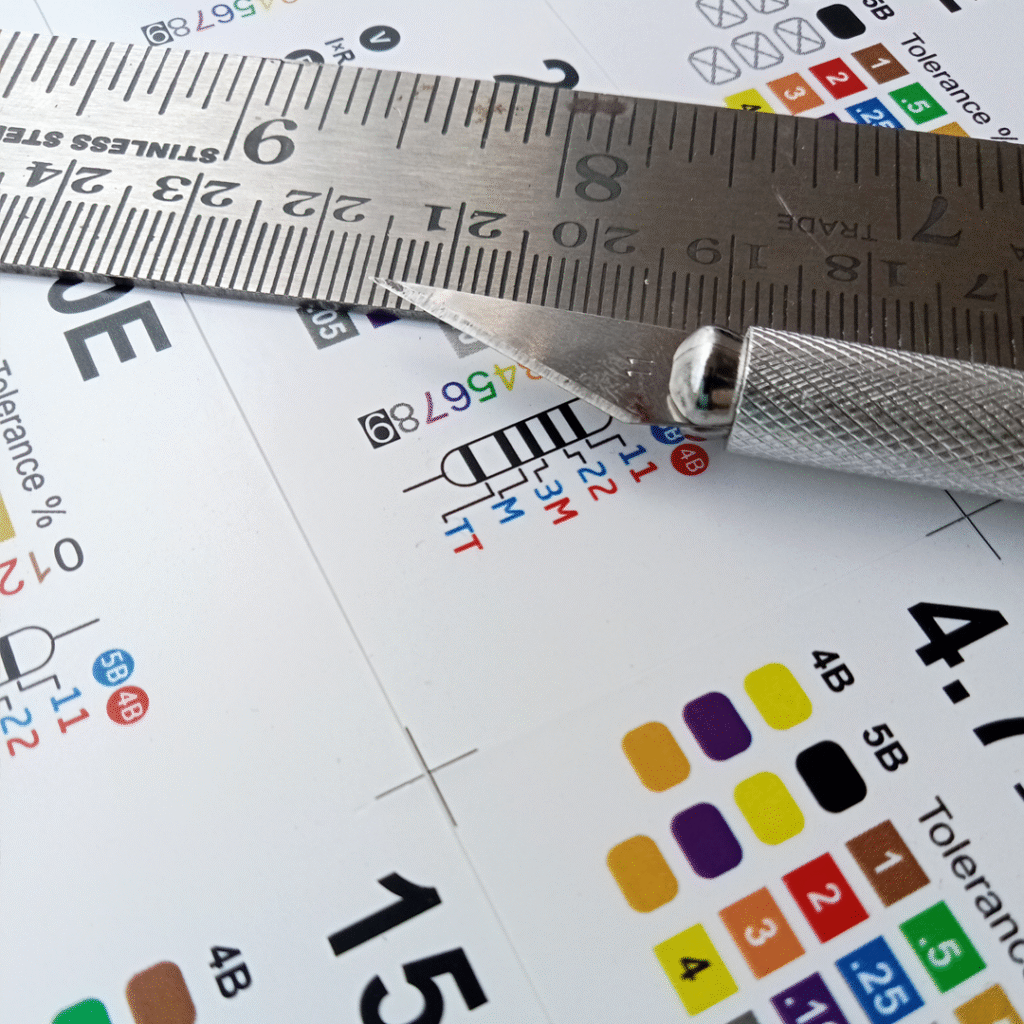 Peeling the individual label from the A3 sheet 