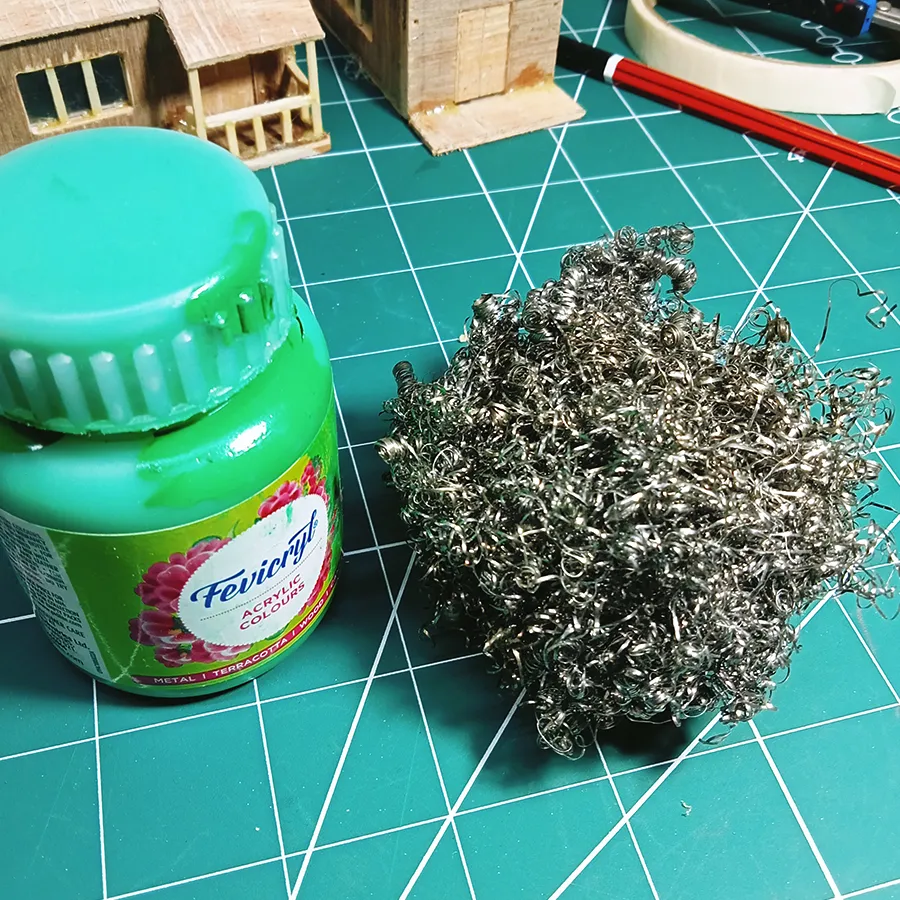 Miniature tree created using a steel scrubber  to create snowy miniature Cristmas theme